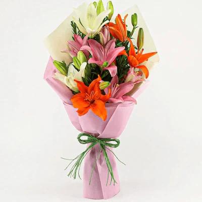 Attractive Mixed Lilies Flower Type: Mixed Lilies , No. of Stems: 8 , Flowers Contains: 2 White Lilies , 3 Pink Lilies , 3 Orange Lilies.

 