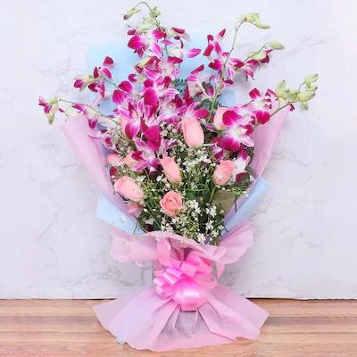 Epitome Of Love Flower Type: Mixed Flowers , No. of Stems: 16 , Flowers Contains: 8 Pink Roses + 8 Purple Orchids..