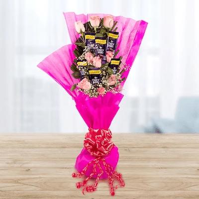 Expressive Love Flower Type: Pink Roses , No of Flower: 9 , Fillers: Seasonal Fillers.


