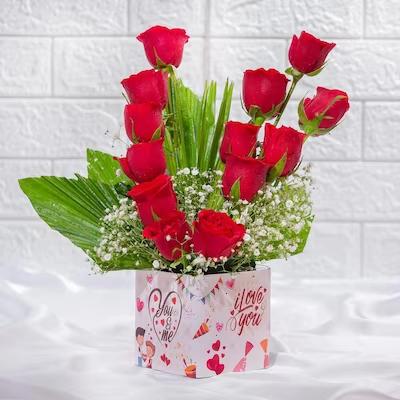 Never Ending Love Roses Arrangement Flower Type: Red Roses , No. of Stems: 13 , Fillers: Green Seasonal Fillers.

