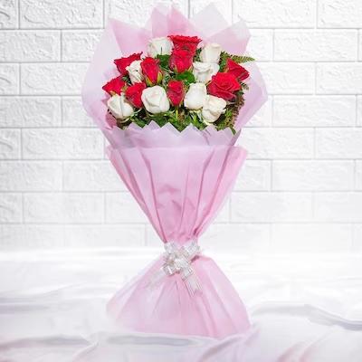 Ravishing Mix Roses Bouquet Flower Type: Mixed Roses , No. of Stems: 18 , Flowers Contains: 9 Red Roses + 9 White Roses.
