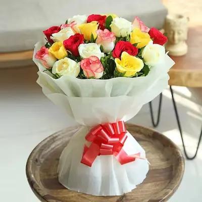 Touch Of Luxury Mix Roses Bouquet Flower Type: Mixed Flowers , No. of Stems: 21 , Flowers Contains: 5 Red Roses , 6 White Roses , 5 Pink Roses , 5 Yellow Roses.

